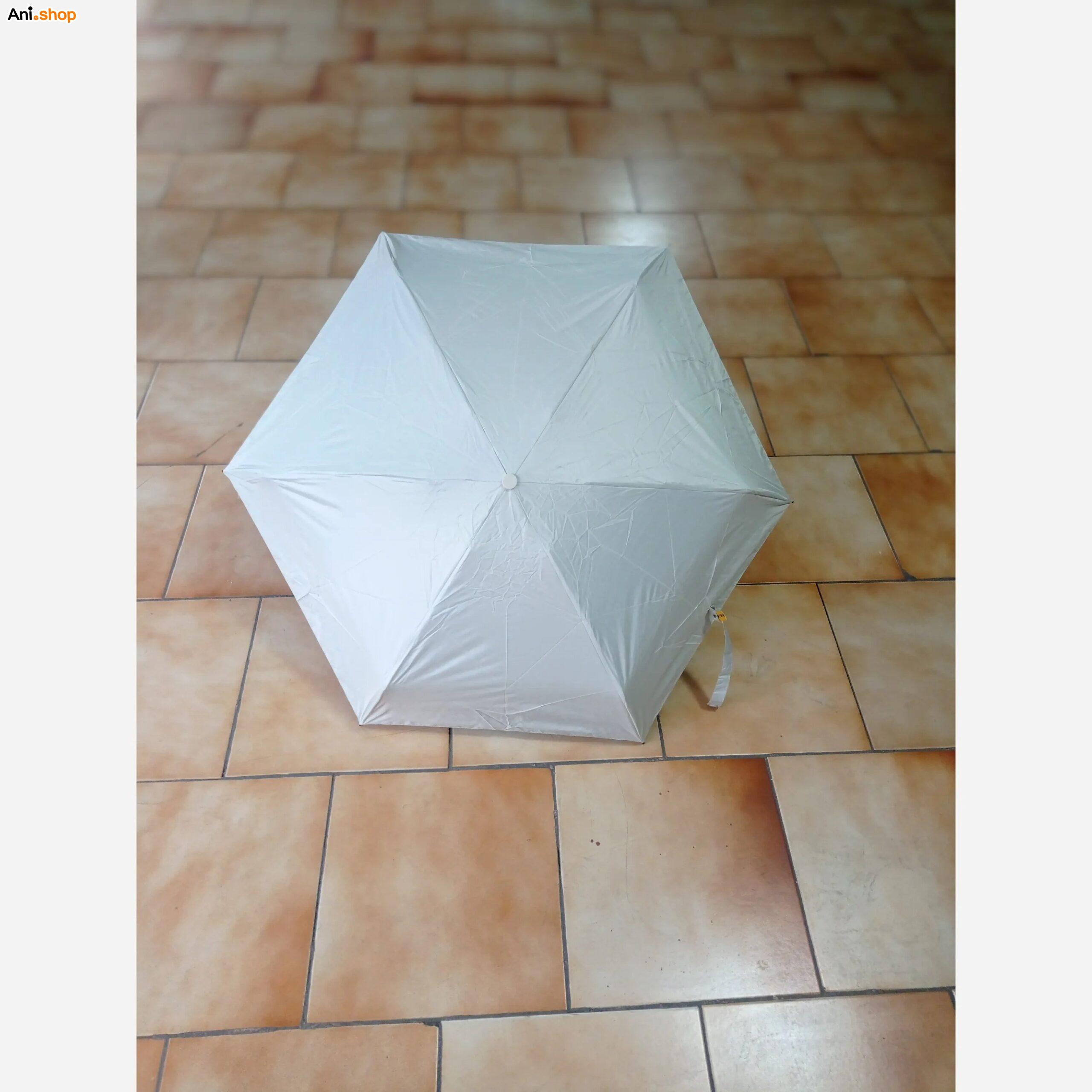 چتر مینی کپسولی جیبی وارداتی مدل تاشو ۵ لایه ضد اشعه UV (محافظ آفتاب و باران) سفید - Image 2